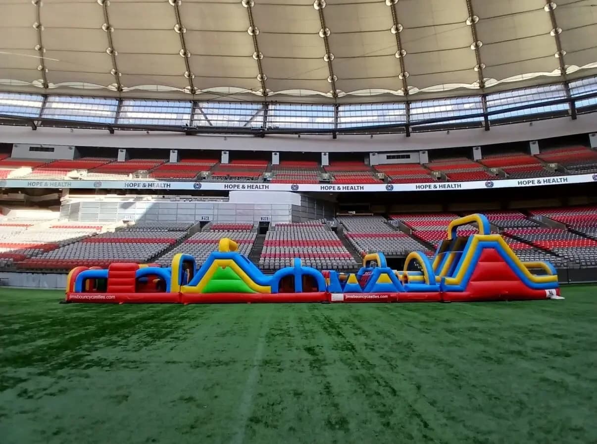 Our custom obstacle course inflated on the field at BC Place stadium